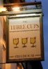 Three-Cups-Sign.jpg